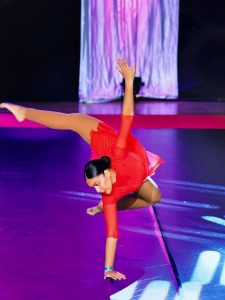 Young person dancing on stage, from the Deborah Day Theatre School Trust