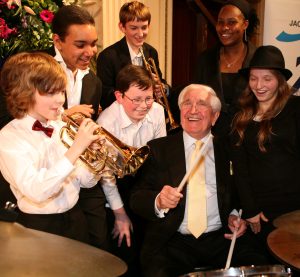 Group photo of young people and Sir Jack Petchey 