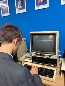 A student on an old computer